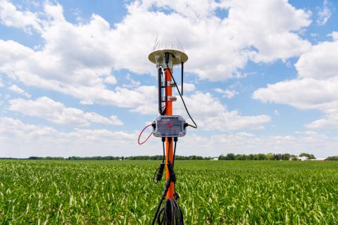 Equipment mast in field